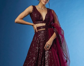Wine Color Sequins Lehenga with Sequins and Pearl Work Choli With Net Dupatta With Four Side Sequins Border Wear And You&#39;re Looking Gorgeous
