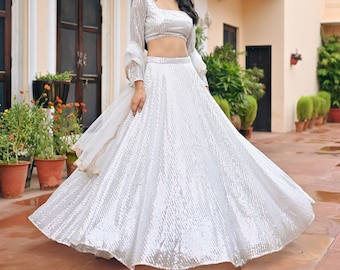 White Sequin Lehenga Set Is A Traditional Outfit That Consists Of Three Main Pieces worn at a Wedding, Engagement, Sangeet, Party, Reception