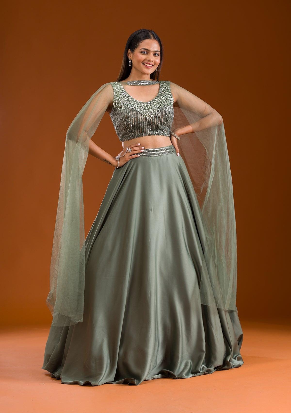 A Mehendi-colored Lehenga Paired With A Handworked Blouse and A