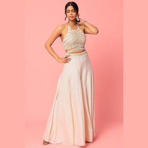 two piece indian bridesmaid dresses Bride in All-White Two-Piece Lehenga Reception Dress, Golden Hour