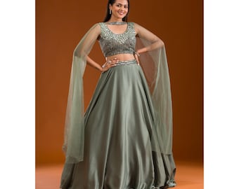 Multicolor Mono Satin Silk Thread-Sequence Embroidery Work Lehenga Choli is a luxurious ethnic outfit that combine traditional craftsmanship