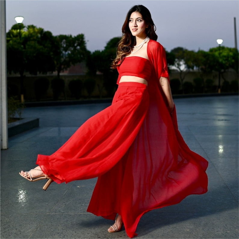 Red Georgette Three Piece Set with Kurta, Dupatta, and Bottomwear is a gorgeous plazzo with a gorgeous blouse, and you look stunning in it. image 3