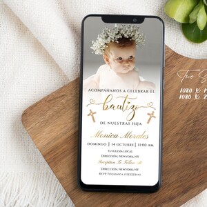May include: A digital invitation for a baby's baptism. The invitation features a photo of a baby girl wearing a white dress and a flower crown. The text on the invitation reads "Acompa&ntilde;anos a celebrar el bautizo de nuestras hija Monica Morales Domingo 14 Octubre 11:00 AM Tu Iglesia Local Direcci&oacute;n, Newyork, NY Reception To Follow t Direcci&oacute;n, Newyork, NY RSVP TO JESSICA (12223344)" and "Two Sizes 1080 x 1920 1080 x 2390".