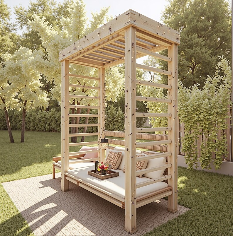 May include: A wooden outdoor daybed with a canopy, featuring a light-colored mattress and decorative pillows. The structure has a ladder-like design on the sides and is surrounded by greenery, creating a relaxing outdoor space.