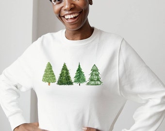 May include: White sweatshirt with a green watercolour design of four Christmas trees.