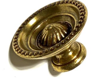 Beaded Lancaster Style Drawer Pull in Antique English Finish Measuring 1-1/4" in Diameter.