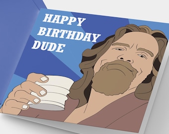 May include: A birthday card with a blue background and the text "HAPPY BIRTHDAY DUDE." The card features an illustration of a man holding a cup. A blue envelope is next to the card.