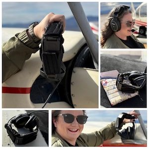May include: Black aviation headset with a microphone and a black carrying case. The headset is resting on a plane wing. The carrying case is black with a buckle closure. The image also shows a person wearing the headset.