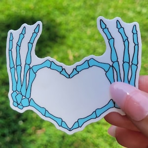 Gothic Skeleton Heart Sticker: Creepily Cute Decal for Laptops, Water Bottles, and More!