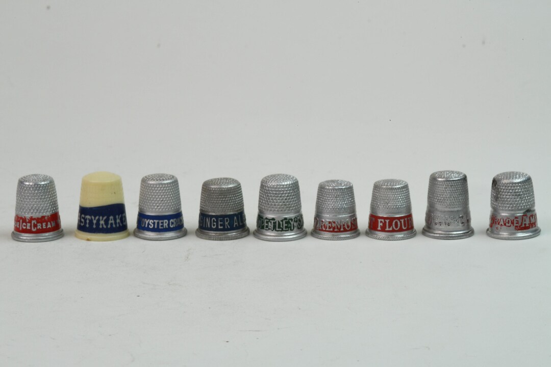 Set of 9 Vintage Advertising Thimbles Food and Drink Tastykake