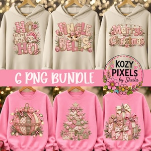 May include: A collection of six beige and pink sweatshirts featuring Christmas-themed graphics including Santa, a cow, ornaments, a tree, and gifts. The designs use a quilted plaid pattern with floral accents. Text includes HO HO HO, JINGLE BELLS, and Merry Christmas.