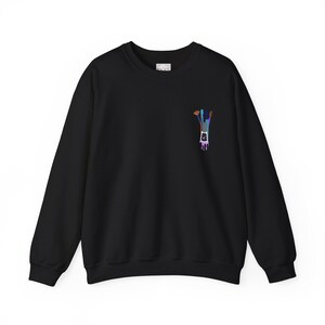 May include: Black sweatshirt with a colorful abstract design on the front. The design is of a hand reaching up with a dripping effect.