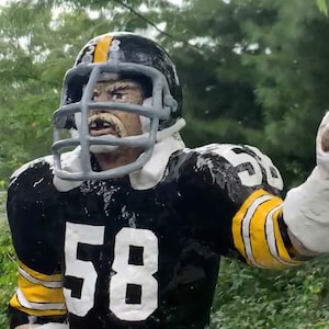 Legendarische Steelers Linebacker Jack Lambert met ontbrekende tanden.