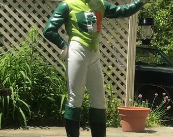 Statue of Irishman with Celtic Cross and Irish flag