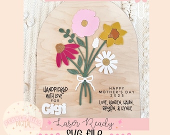 May include: A laser-cut wooden sign with a floral bouquet design. The sign reads "Handpicked with love for Gigi" and "Happy Mother's Day 2025 Love, Kanden, Halen, Brylen, & Hynlie". The sign is labeled "Laser Ready SVG File".