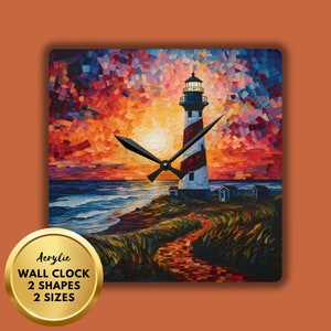 Könnte beinhalten: Acryluhr an der Wand mit einem farbenfrohen Mosaikgemälde eines Leuchtturms an einem felsigen Ufer mit einem Weg, der dorthin führt. Der Himmel ist ein lebendiger Sonnenuntergang in Orange-, Rot- und Lilatönen. Die Uhrzeiger sind schwarz.