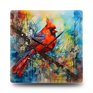 May include: A watercolor painting of a red cardinal perched on a branch with a clock face superimposed over the bird. The background is a colorful abstract design with splashes of blue, yellow, and green.