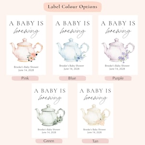 May include: Five rectangular labels with the text A BABY IS brewing and Brooke's Baby Shower June 14, 2028. Each label features a watercolor teapot in pink, blue, purple, green, or tan, decorated with matching floral accents at the base.