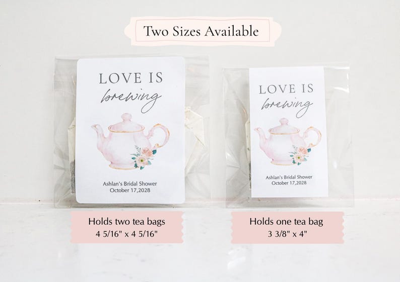 May include: Two clear plastic pouches containing tea bags with white labels. The labels feature a pink teapot illustration, floral accents, and the text 'LOVE IS brewing', 'Ashlan's Bridal Shower', and 'October 17, 2028'. Sizes are 4 5/16" x 4 5/16" and 3 3/8" x 4".