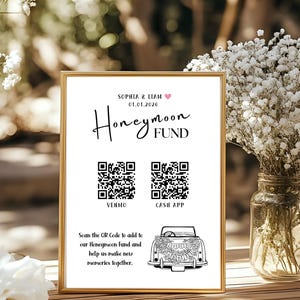 以下が含まれることがあります： 金色のフレームに入ったサインで、筆記体で「Honeymoon Fund」と書かれています。VenmoとCash AppのQRコード、Sophia & Liamの名前、日付01.01.2026が含まれています。下部にはヴィンテージカーのイラストがあります。