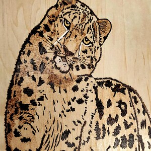 Pièce unique d'oeuvres d'art cuites à la main. Le prix comprend le cadre.