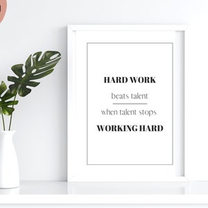 May include: White framed motivational poster with the text "HARD WORK beats talent when talent stops WORKING HARD".