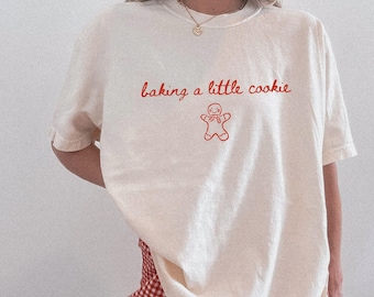 Baking A Little Cookie Christmas Pregnancy Reveal Shirt Comfort Colors Baby Announce Tee Expecting New Mom Tshirt Mommy Gift Xmas Maternity