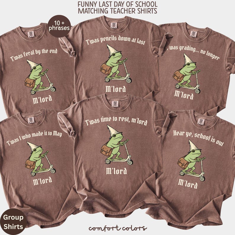 May include: Brown Comfort Colors t-shirts with various phrases for teachers on the last day of school. Each shirt features a cartoon frog riding a scooter, wearing a wizard hat and carrying a satchel. Phrases include "Twas pencils down at last" and "Hear ye, school is out."