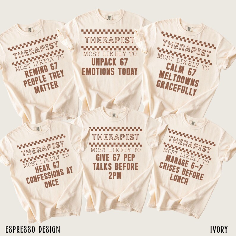 May include: Ivory-colored t-shirts with the word "THERAPIST" and various phrases like "MOST LIKELY TO UNPACK 67 EMOTIONS TODAY" in brown text. The shirts have a checkered design above the word "THERAPIST". The brand name "ESPRESSO DESIGN" is at the bottom.