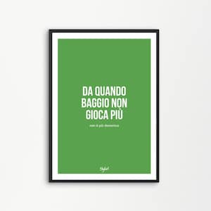 May include: A green poster with white text that reads "Da quando Baggio non gioca più non è più domenica". The poster is framed in black.