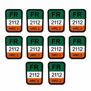 Puede incluir: Un conjunto de diez pegatinas rectangulares. Cada pegatina presenta una sección superior verde, una sección media blanca con el número "2112" y una sección inferior naranja con el texto "HRC 2". Las letras "FR" están en la esquina superior izquierda.