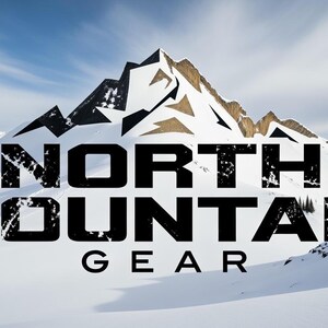 May include: A snowy mountain range under a blue sky with the words "NORTH MOUNTAIN GEAR" in bold, black, distressed font. The image evokes a sense of adventure and suggests outdoor equipment or apparel.