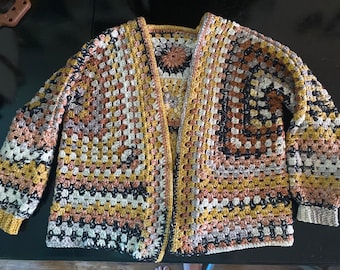 Crochet cardigan with flower detail