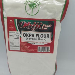 Puede incluir: Una bolsa sellada de harina de Okpa (frijoles Bambara) de Obiji Foods Ltd. La bolsa tiene un diseño rojo y blanco con el nombre de la marca e información del producto. La bolsa contiene 450g de harina.