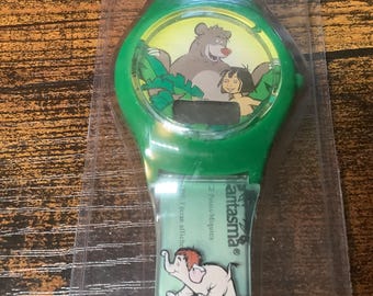 Disney Jungle Book Watch, children’s, still sealed, green strap with characters on the face and each side of it.