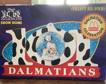 101 Dalmatians Ornaments 1996 set of 2, Dalmatians Celebrations (101) & Snow Flurries (Yellow Bow) snow globe Ornaments, still sealed.