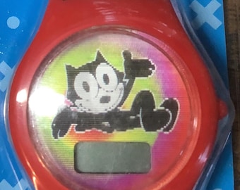 Watch, Winking Felix the Cat. Move side to side he winks. 5 function digital. Never opened, still sealed.