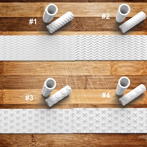 May include: White textured rolling pins and matching patterned mats are displayed on a wooden surface. The rolling pins have different embossed designs, including wavy lines and bow patterns. The image is labeled with numbers.