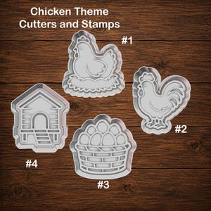 May include: Four light gray plastic cookie cutters and stamps labeled Chicken Theme Cutters and Stamps. The shapes include a hen in a nest, a rooster, a basket of eggs, and a chicken coop, each marked with a corresponding number from one to four.