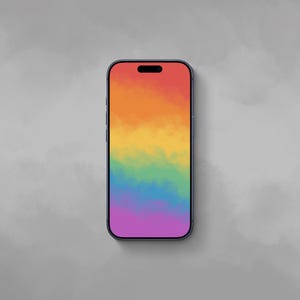 May include: A smartphone with a dark frame and a vibrant, multi-coloured screen display. The screen features a smooth, horizontal gradient pattern transitioning through shades of red, orange, yellow, green, blue, and purple in a soft, cloud-like texture.