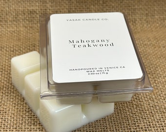 May include: A clear plastic container of wax melts with a label that reads "YASAK CANDLE CO. Mahogany Teakwood HANDPOURED IN VENICE CA WAX MELTS 2.50 oz 171 g"
