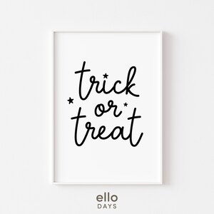 May include: A white printable art print with black text that reads "trick or treat" with stars on either side of the word "or".