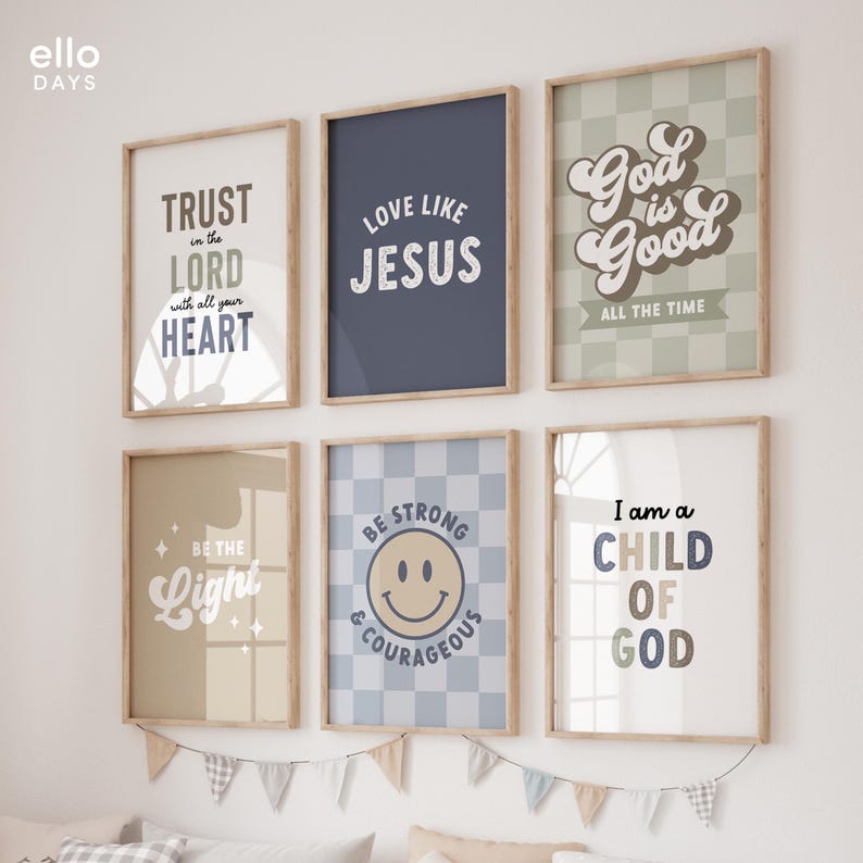 May include: Six framed prints with inspirational quotes in a light brown wood frame. The prints have a light blue, light brown, and green background with white text. The quotes are: "Trust in the Lord with all your heart", "Love Like Jesus", "God is Good All the Time", "Be the Light", "Be Strong & Courageous", and "I am a Child of God".