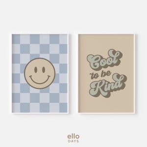 May include: Two framed prints with a retro aesthetic. The print on the left features a blue and white checkered background with a yellow smiley face. The print on the right has a tan background with the text "Cool to be Kind" in a green and brown font.