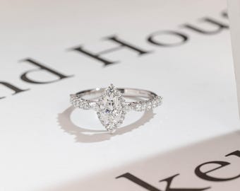 Anello di fidanzamento in oro massiccio con moissanite taglio marquise, contorno di diamanti e mezzo pavé, 20240128-1-E