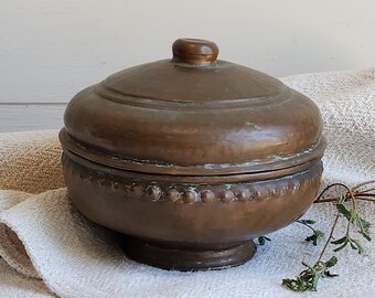 Vintage lidded and footed copper bowl