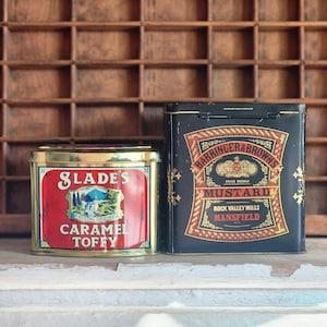 Pair of vintage English tin containers mustard and caramel toffy