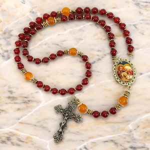 Sacred Mysteries Rosary, Dark Red and Golden Yellow Agate Beads, Solid Brass Accents, Sealed Holy Image Centerpiece and Crucifix Options