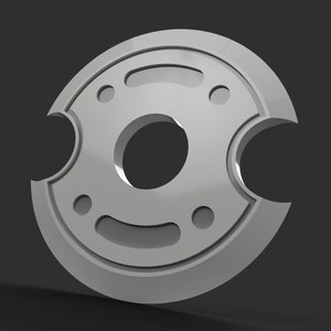 May include: A silver-colored, circular object with a central hole and several smaller holes and cutouts. The object has a smooth, metallic finish and is set against a dark gray background. The design is symmetrical and geometric.