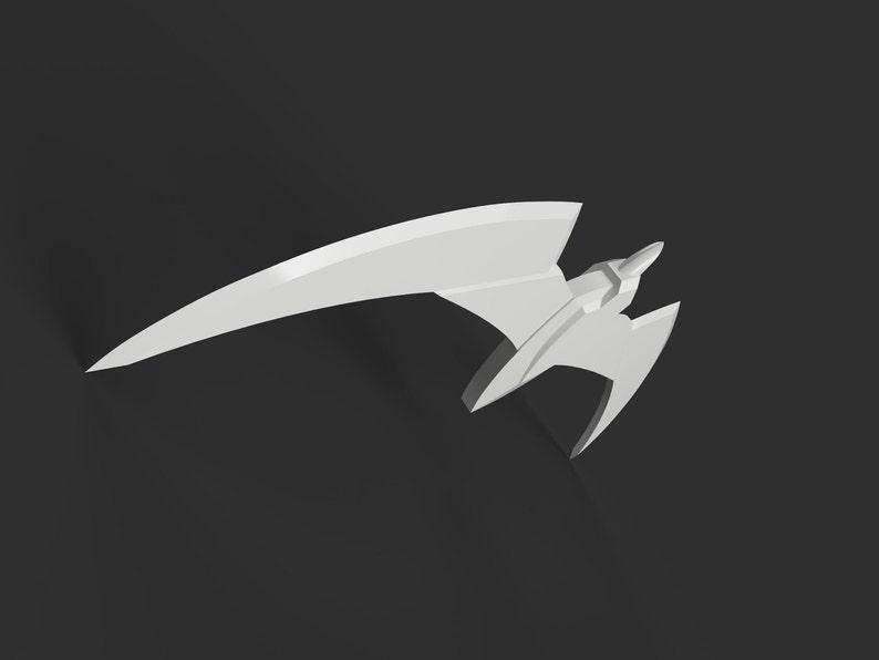 May include: A white, stylized, geometric sculpture resembling a futuristic aircraft or weapon. The design features a long, curved wing and a central body with angular elements. The object is set against a dark background.